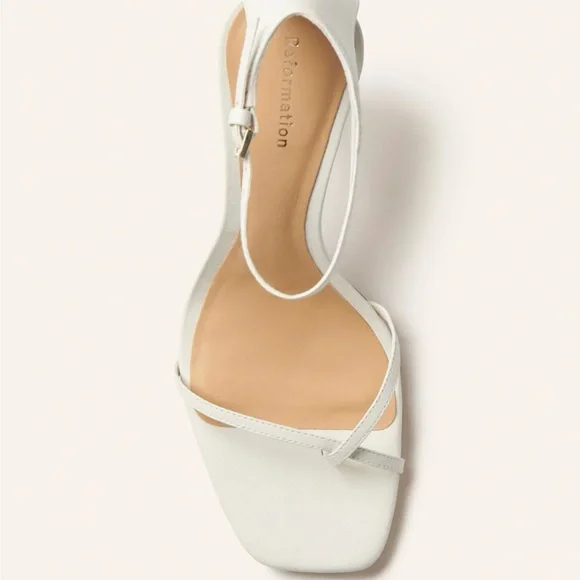 Reformation Gigi Strappy Mid Heel Sandal
Almond 9 $278 Curent - Picture 3 of 8